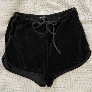 Black velvet shorts by Juicy Couture